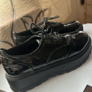 Black leather platform shoes